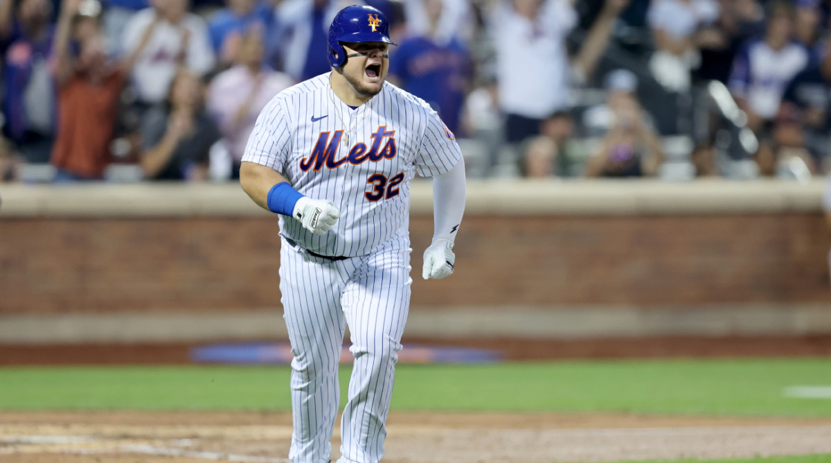 Mets DH Daniel Vogelbach celebrates a home run.